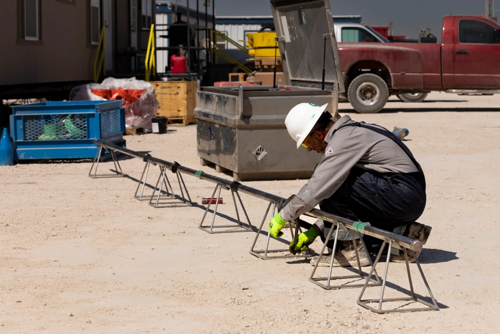 ProDirectional technician preparing MWD tools and directional drilling equipment at the wellsite